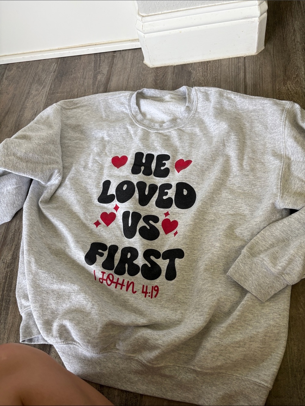 Gray Crewneck Sweatshirt with Red Heart Graphic - He Loved Us First